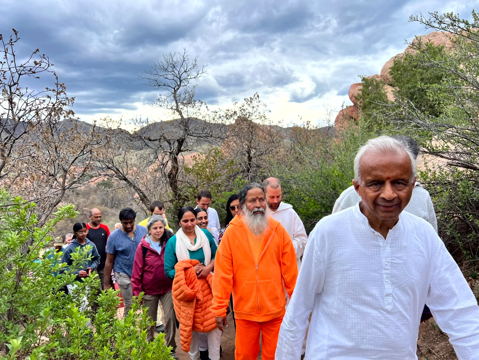 Temple of Peace community walking together in the Colorado foothills